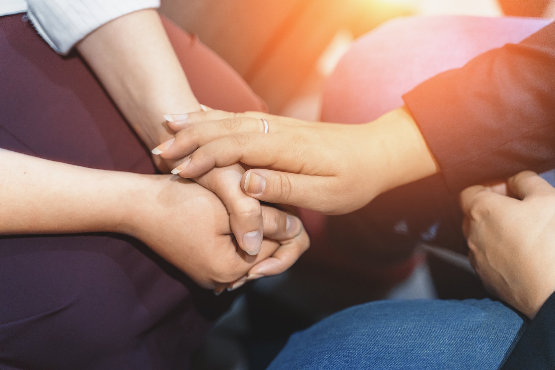 Psychologist session, close up on hands of doctor and patient, mental health, support and counseling concept